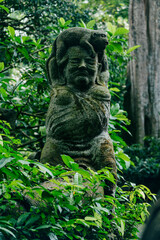 Statue in the Monkey Forest, Ubud, Bali, Indonesia.