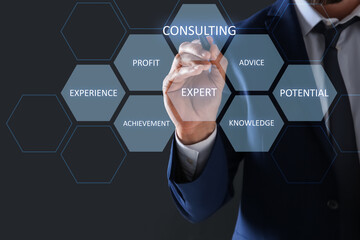 Consulting. Businessman using digital screen on dark background, closeup