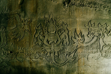Relief carving on a wall in Monkey Forest, Ubud, Bali, Indonesia.