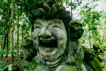 Monkey statues in Monkey Forest, Ubud, Bali, Indonesia.