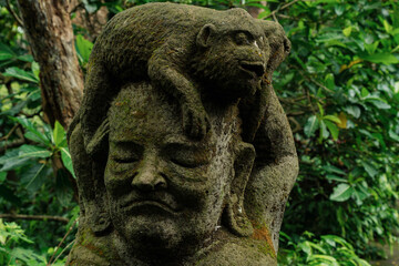 Sculpture of Monkey in the Monkey Forest. Ubud, Bali, Indonesia.