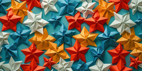 Colorful origami paper stars on blue background for festive decoration and creative crafts concept