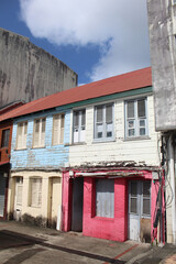 Colorful wooden rowhouses with peeling paint in Fort-de-France, Martinique