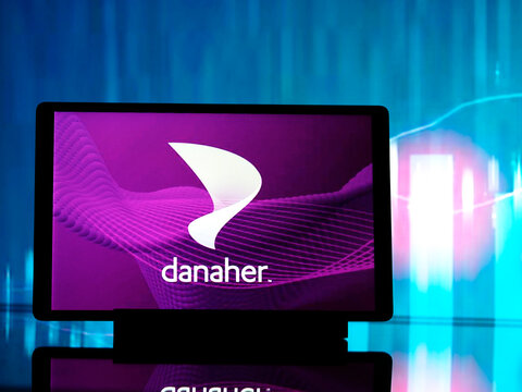 In this photo illustration,  Danaher Corporation  logo seen displayed on a tablet
