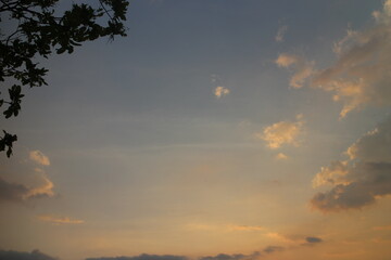 Colorful cloudy sky at sunset. golden color. Sky texture, abstract nature background