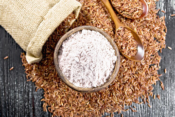 Flour red rice in bowl on board top