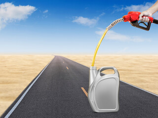 Hold the gasoline injector into the gallon. There are road and desert backgrounds.