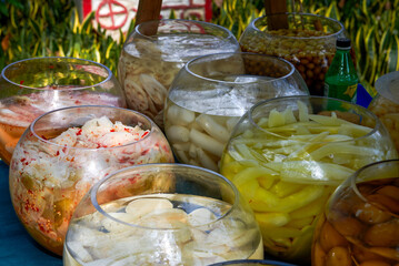 Various flavors of sour food sold at a sour food stall in Nanning, Guangxi, China