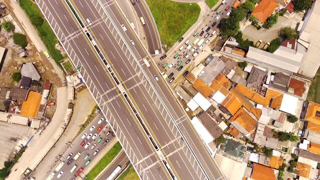 Drone Footage. Shot in 4K Resolution 30 Fps. Aerial shot of Cileunyi Highway Interchange, Purbaleunyi Toll Road during holiday season, Bandung, West Java Indonesia, Asia.