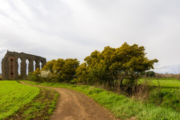 Park of the Aqueducts (Parco degli Acquedotti), an archeological public park in Rome, Italy, part of the Appian Way Regional Park, with monumental ruins of Roman aqueducts.