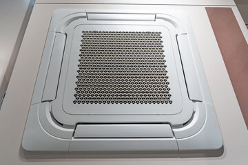 Ceiling mounted cassette type air conditioner.