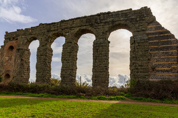 Park of the Aqueducts (Parco degli Acquedotti), an archeological public park in Rome, Italy, part of the Appian Way Regional Park, with monumental ruins of Roman aqueducts.