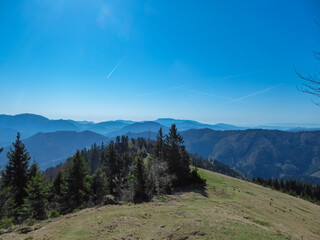 Panoramic view of alpine landscape seen from mountain summit of Hochanger in Bruck an der Mur,...