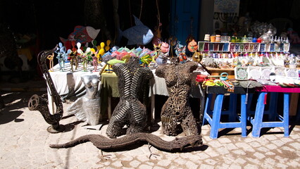 Vendor selling souvenirs in the medina in Essaouira, Morocco