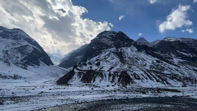 Snow filled mountains with blue skies landscape near Manali Kashmir Rothang pass India