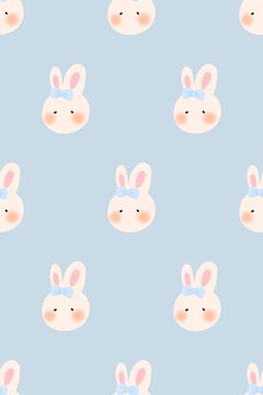 a pattern with cute bunny faces on a blue background