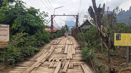 railway in the mountains, wood bridge in the village