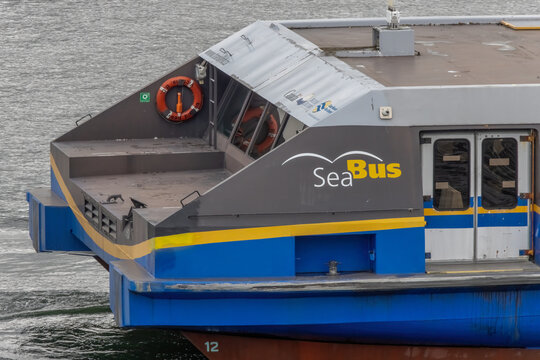 Vancouver, British Columbia, Canada. Mar 26, 2024. Back view of a Sea Bus passenger ferry that crosses the Burrard Inlet, connecting Downtown Vancouver to North Vancouver.