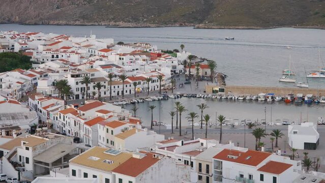 Late afternoon warm light over Fornells village in Menorca Island, Spain