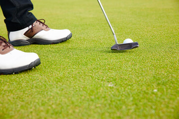 Feet, club and golf ball for sports on field, training and practice for competition or tournament....