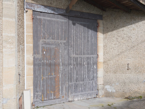 wooden old door entrance barn garage ancient house building facade