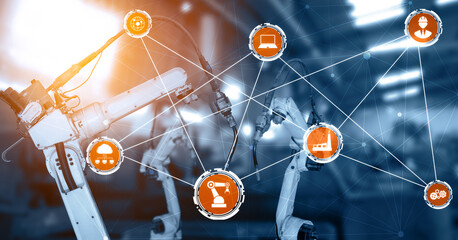 XAI Smart industry robot arms for digital factory production technology showing automation manufacturing process of the Industry 4.0 or 4th industrial revolution and IOT software to control operation.