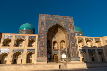 View over the Poi Kalon Mosque and Minaret at the sunset, Bukhara, Uzbekistan.