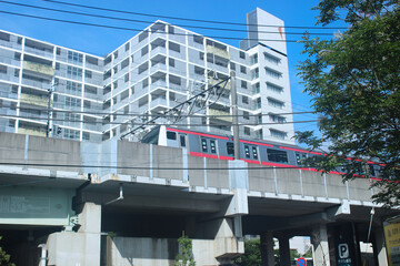 buildings and train crossing in Japan, Tokyo
