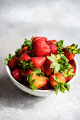 Bowl with ripe organic strawberries