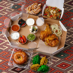 restaurant food in takeaway containers
