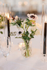 Intimate wedding table setting with anemones