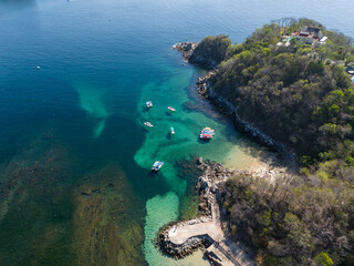 Drone views of La Entrega Beach, coral reefs and marine life of Huatulco, Oaxaca