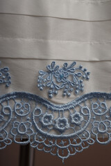 the floral ornament is professionally made in the style of fabric appliqué