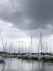 Naklejka premium Harbour of Procida Island, Italy. Traditional fishing boats. South of Italy