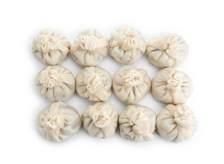 Fototapeta premium Many tasty khinkali (dumplings) isolated on white, top view. Georgian cuisine