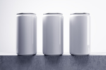 Three empty white drink cans on light background with mock up place. Beverage and food ad concept. 3D Rendering.