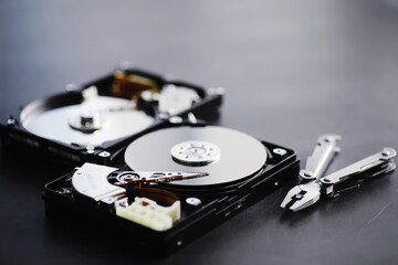 Computer accessories. The disassembled hard drive. Repair of components PC. Broken external hard...