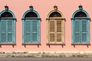 Gardinen a row of windows on a pink wall © moonpro