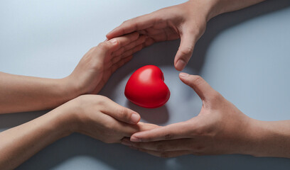 red heart in adult hands , health care, organ donation, family life insurance, world heart day,brain stroke.