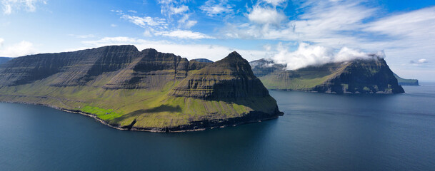 Aerial Panorama outdoor landscape mountain scene of Vidoy island. Summer view of Faroe Islands