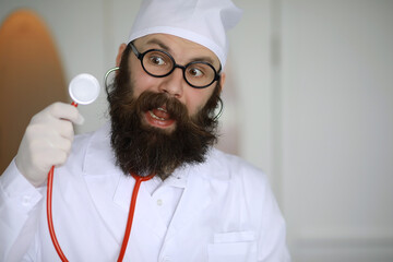 Doctor crazy. A mad beard scientist conducts experiments in a scientific laboratory. Performs...