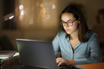 Tele worker working with eyeglasses in the night - 773791889