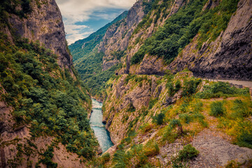 Exciting summer view of deep canyon of Piva river. Rocky morning scene of Montenegro, Europe. Beautiful world of Mediterranean countries. Travel the world..