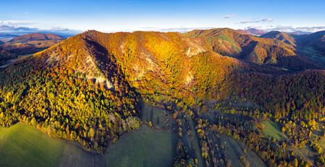 Drone mountain panorama with autumn forest.