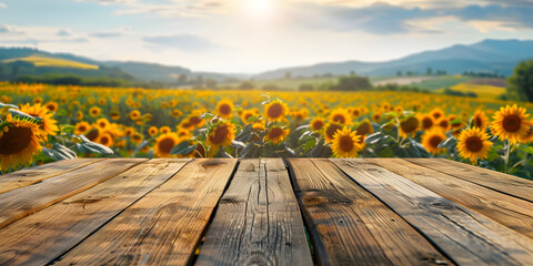 Empty wooden board on sunflowers field background, Empty rustic old wooden boards table copy space with sunflower field, mountain, background, afternoon sun above. Product display template mockup conc - obrazy, fototapety, plakaty