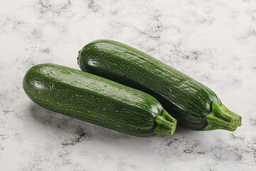 Raw green ripe zucchini vegetable