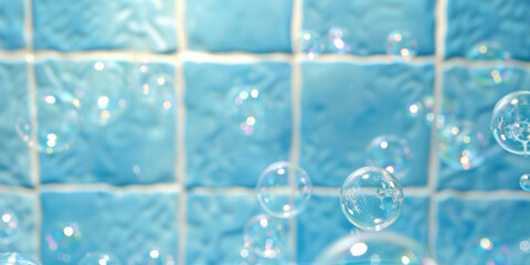 Floating transparent soap bubbles in blue tile bathroom. Having bubble bath shower skincare enjoying relaxation moment concept