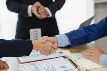 Business meeting of real estate brokers Business working on new startup project, analysis plan,...