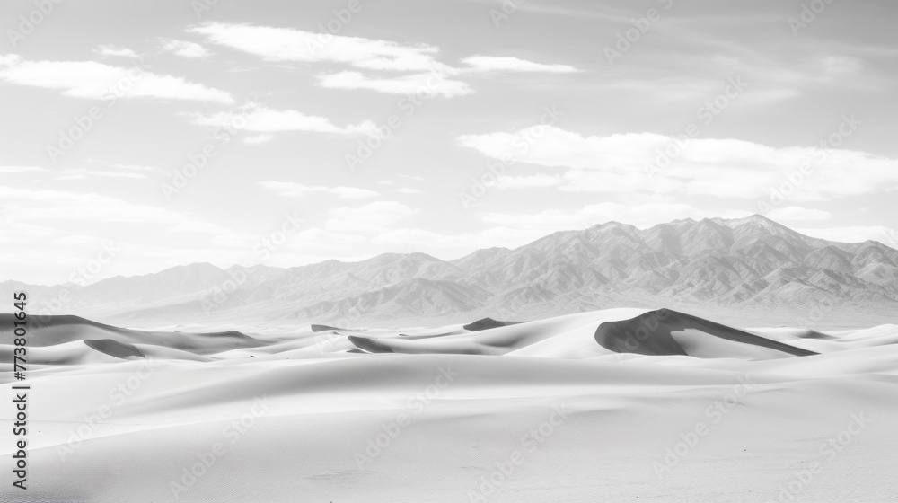 Aufkleber a vast, empty desert with a mountain range in the background