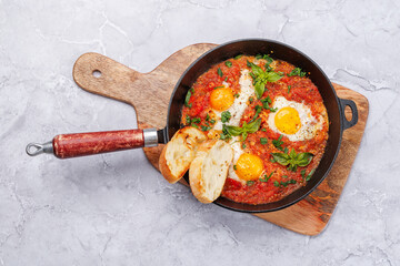 Delicious shakshuka breakfast in a pan